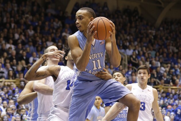 North Carolina's Brice Johnson (11) grabs a rebound against Duke during the first half of an NCAA college basketball game in Durham, N.C., Saturday, March 5, 2016. (AP Photo/Gerry Broome)