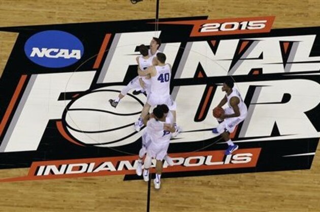 Duke players celebrate after the NCAA Final Four college basketball tournament championship game against Wisconsin  Monday, April 6, 2015, in Indianapolis. Duke won 68-63. (AP Photo/David J. Phillip)