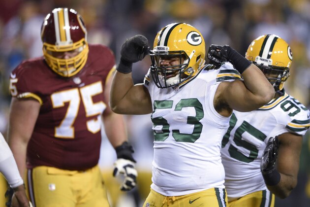 Green Bay Packers outside linebacker Nick Perry (53) celebrates his sack of Washington Redskins quarterback Kirk Cousins as Redskins offensive guard Brandon Scherff (75) looks down during the second half of an NFL wild-card playoff football game in Landover, Md., Sunday, Jan. 10, 2016. The Packers won 35-18. (AP Photo/Nick Wass)