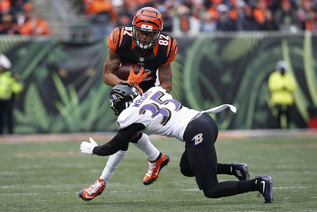 Cincinnati Bengals wide receiver Marvin Jones (82) runs the ball against Baltimore Ravens defensive back Shareece Wright (35) in the first half of an NFL football game, Sunday, Jan. 3, 2016, in Cincinnati. (AP Photo/Frank Victores)