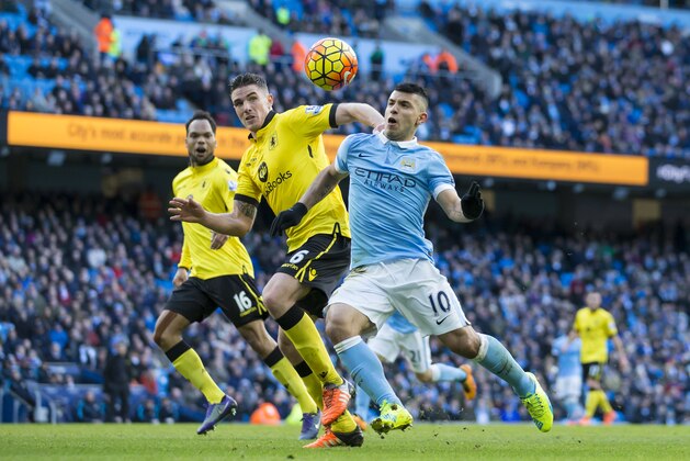 Manchester City's Sergio Aguero, right, fights for the ball against Aston Villa's Ciaran Clark during the English Premier League soccer match between Manchester City and Aston Villa at the Etihad Stadium in Manchester, England, Saturday March 5, 2016. (AP Photo/Jon Super)