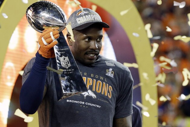 Denver Broncos’ Von Miller (58) holds the trophy after the NFL Super Bowl 50 football game Sunday, Feb. 7, 2016, in Santa Clara, Calif. The Broncos won 24-10.(AP Photo/Julie Jacobson)