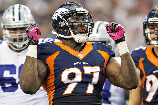 ARLINGTON, TX - OCTOBER 6: Malik Jackson #97 of the Denver Broncos celebrates after a big play against the Dallas Cowboys at AT&T Stadium on October 6, 2013 in Arlington, Texas. The Broncos defeated the Cowboys 51-48. (Photo by Wesley Hitt/Getty Images)