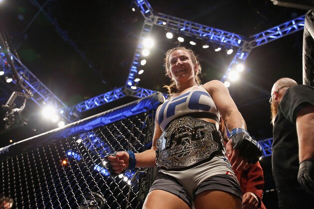 LAS VEGAS, NV - MARCH 05:  Miesha Tate exits the Octagon after defeating Holly Holm in their UFC women's bantamweight championship bout during the UFC 196 event inside MGM Grand Garden Arena on March 5, 2016 in Las Vegas, Nevada.  (Photo by Christian Petersen/Zuffa LLC/Zuffa LLC via Getty Images)