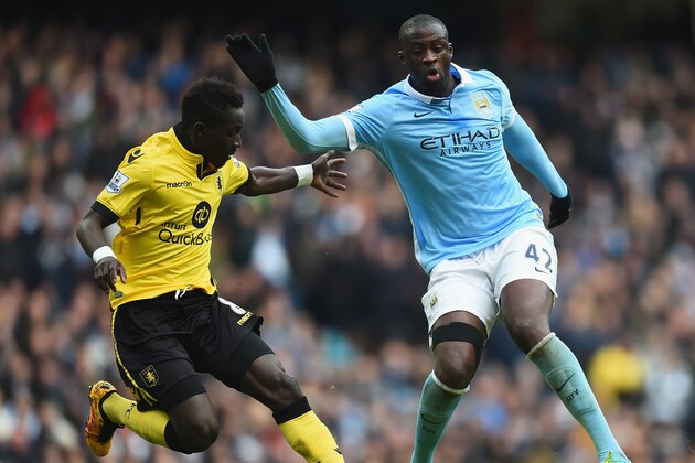 MANCHESTER, ENGLAND - MARCH 05:  Yaya Toure of Manchester City and Idrissa Gueye of Aston Villa compete for the ball during the Barclays Premier League match between Manchester City and Aston Villa at Etihad Stadium on March 5, 2016 in Manchester, England.  (Photo by Laurence Griffiths/Getty Images)