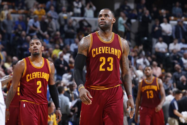 INDIANAPOLIS, IN - FEBRUARY 1: LeBron James #23 and Kyrie Irving #2 of the Cleveland Cavaliers look on against the Indiana Pacers during the game at Bankers Life Fieldhouse on February 1, 2016 in Indianapolis, Indiana. The Cavaliers defeated the Pacers 111-106 in overtime. NOTE TO USER: User expressly acknowledges and agrees that, by downloading and or using the photograph, User is consenting to the terms and conditions of the Getty Images License Agreement. (Photo by Joe Robbins/Getty Images)