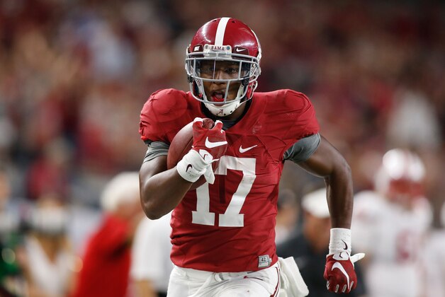 Sep 5, 2015; Arlington, TX, USA;  Alabama Crimson Tide running back Kenyan Drake (17) runs against the Wisconsin Badgers at AT&T Stadium. Alabama won 35-17. Mandatory Credit: Tim Heitman-USA TODAY Sports