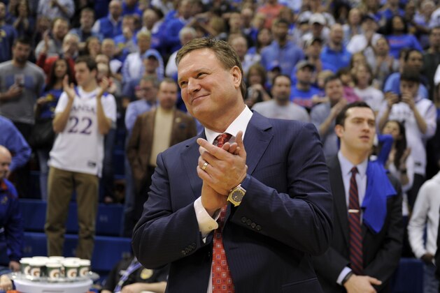 LAWRENCE, KS - FEBRUARY 27: Bill Self head coach of the Kansas Jayhawks claps for his team as they celebrate winning the Big 12 Conference Championship after they defeated Texas Tech Red Raiders 67-58 at Allen Fieldhouse on February 27, 2016 in Lawrence, Kansas. With the win, Kansas clinched its 12th straight conference championship. (Photo by Ed Zurga/Getty Images)