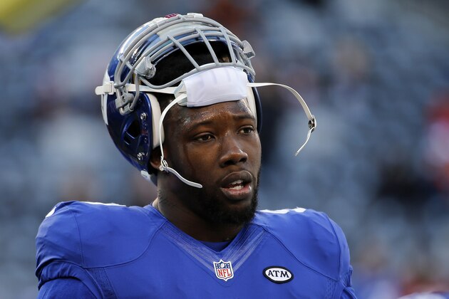 FILE - In this Jan. 3, 2016, file photo, New York Giants defensive end Jason Pierre-Paul (90) warms up before playing against the Philadelphia Eagles in an NFL football game in East Rutherford, N.J. Citing unfinished business, Pierre-Paul said Tuesday, March 8, 2016, he has agreed to terms on a new contract with the Giants.  (AP Photo/Julio Cortez, File)