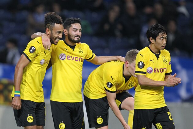 OPORTO, PORTUGAL - FEBRUARY 25:  Dortmund's forward Aubameyang celebrate scoring Dortmund goal with Dortmund's midfielder Shinji Kagawa and Dortmund's midfielder Ilkay Gundogan during the Champions League match between  FC Porto and Borussia Dortmund for UEFA Europa League Round of 32: Second Leg at Estadio do Dragao on February, 2016 in Porto, Portugal.  (Photo by Carlos Rodrigues/Getty Images)