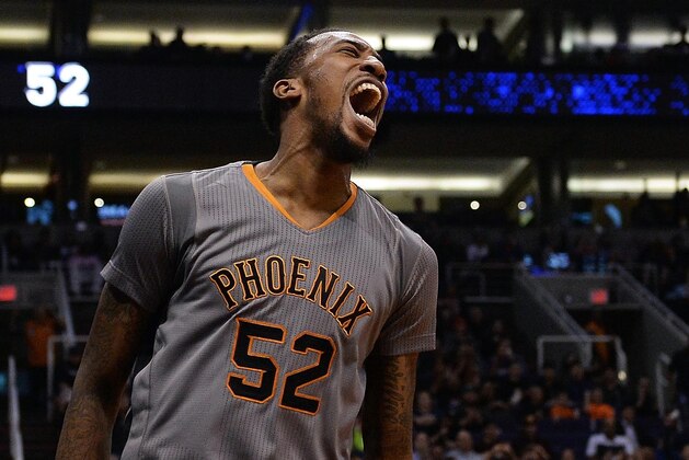 Feb 4, 2016; Phoenix, AZ, USA;  Phoenix Suns guard Jordan McRae (52) yells are making a basket in the second half against the Houston Rockets at Talking Stick Resort Arena. The Rockets won 111 - 105. Mandatory Credit: Jennifer Stewart-USA TODAY Sports