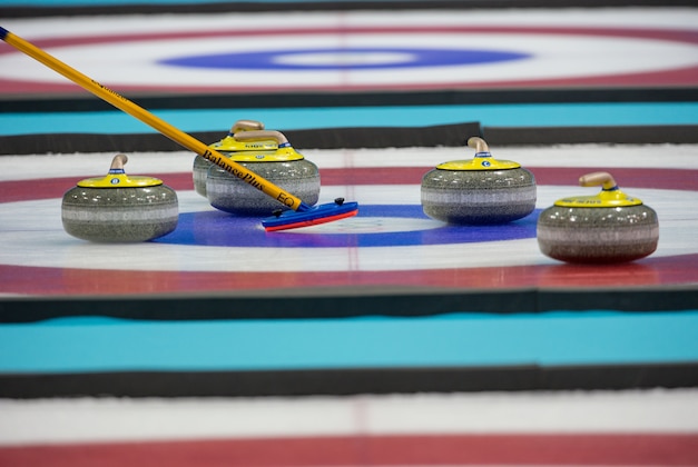 Feb 20, 2014; Sochi, RUSSIA; Detail of the stones on the ice in the women's gold medal curling match between Sweden and Canada during the Sochi 2014 Olympic Winter Games against Sweden at Ice Cube Curling Center. Mandatory Credit: Kevin Liles-USA TODAY Sports