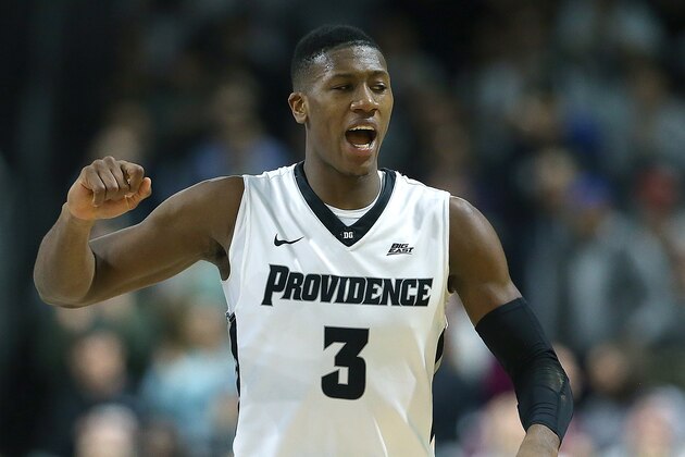 PROVIDENCE, RI - MARCH 2:  Kris Dunn #3 of the Providence Friars celebrates in the second half against the Creighton Bluejays on March 2, 2016, at the Dunkin' Donuts Center in Providence, Rhode Island. (Photo by Jim Rogash/Getty Images)