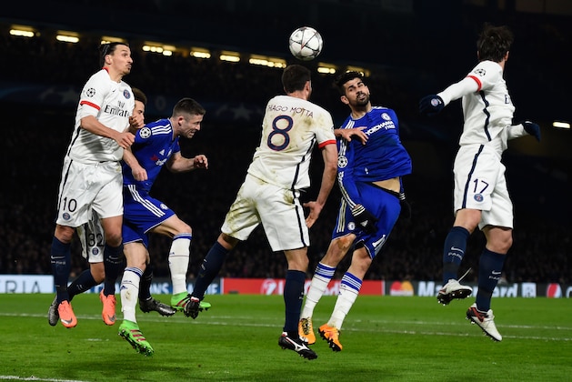 LONDON, ENGLAND - MARCH 09:  Thiago Motta of PSG and Diego Costa of Chelsea compete for a header during the UEFA Champions League round of 16, second leg match between Chelsea and Paris Saint Germain at Stamford Bridge on March 9, 2016 in London, United Kingdom.  (Photo by Mike Hewitt/Getty Images)