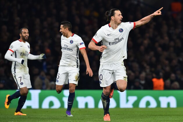 Paris Saint-Germain's Swedish forward Zlatan Ibrahimovic (R) celebrates scoring his team's second goal during the UEFA Champions League round of 16 second leg football match between Chelsea and Paris Saint-Germain (PSG) at Stamford Bridge in London on March 9, 2016.  / AFP / BEN STANSALL        (Photo credit should read BEN STANSALL/AFP/Getty Images)