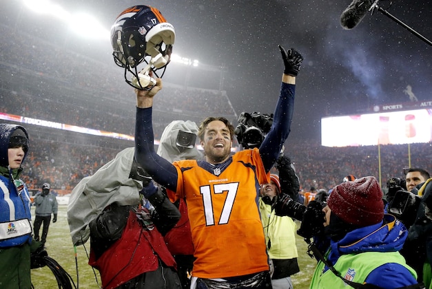 Denver Broncos quarterback Brock Osweiler (17) celebrates after an NFL football game against the New England Patriots, Sunday, Nov. 29, 2015, in Denver. The Broncos defeated the Patriots 30-24. (AP Photo/Jack Dempsey)