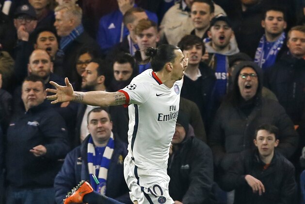 PSG's Zlatan Ibrahimovic celebrates scoring his side’s second goal during the round of sixteen second leg Champions League soccer match between Chelsea and Paris Saint-Germain at Stamford Bridge stadium in London, Wednesday, March 9, 2016. (AP Photo/Kirsty Wigglesworth)