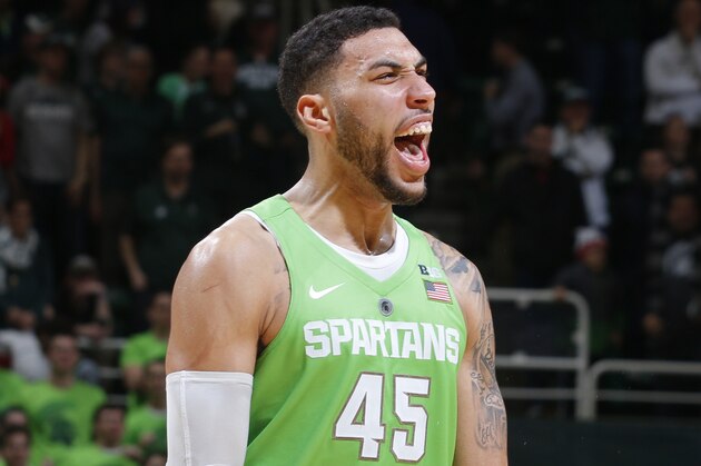 Michigan State's Denzel Valentine celebrates following an NCAA college basketball game against Maryland, Saturday, Jan. 23, 2016, in East Lansing, Mich. Michigan State won 74-65. (AP Photo/Al Goldis)