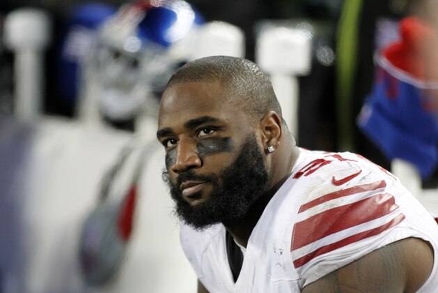 New York Giants defensive end Robert Ayers (91) sits on the bench during the second half of an NFL football game against the Minnesota Vikings, Sunday, Dec. 27, 2015, in Minneapolis. The Vikings won 49-17. (AP Photo/Andy Clayton-King)