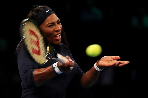 NEW YORK, NY - MARCH 08:  Serena Williams returns a shot to Caroline Wozniacki during their match at the BNP Paribas Showdown at Madison Square Garden on March 8, 2016 in New York City.  (Photo by Elsa/Getty Images)