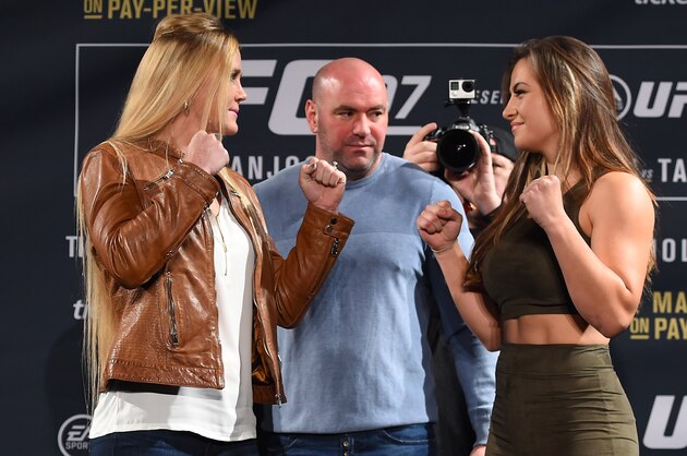 LAS VEGAS, NV - JANUARY 20:  UFC President Dana White squares off Holly Holm (L) and Miesha Tate (R) during the UFC 197 on-sale press conference event inside MGM Grand Hotel & Casino on January 20, 2016 in Las Vegas, Nevada. (Photo by Jeff Bottari/Zuffa LLC/Zuffa LLC via Getty Images)