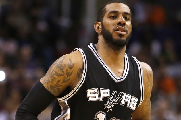 San Antonio Spurs forward LaMarcus Aldridge (12) in the third quarter during an NBA basketball game against the Phoenix Suns, Sunday, Feb. 21, 2016, in Phoenix. The Spurs defeated the Suns 118-111. (AP Photo/Rick Scuteri)