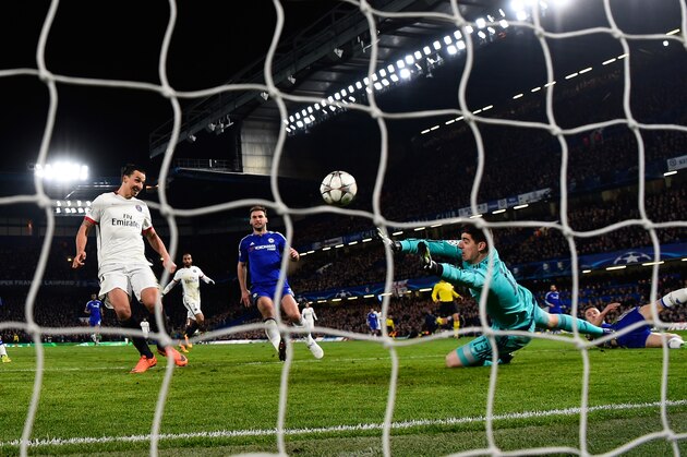 LONDON, ENGLAND - MARCH 09:  Zlatan Ibrahimovic of PSG scores his team's second goal past goalkeeper Thibaut Courtois of Chelsea during the UEFA Champions League round of 16, second leg match between Chelsea and Paris Saint Germain at Stamford Bridge on March 9, 2016 in London, United Kingdom.  (Photo by Mike Hewitt/Getty Images)
