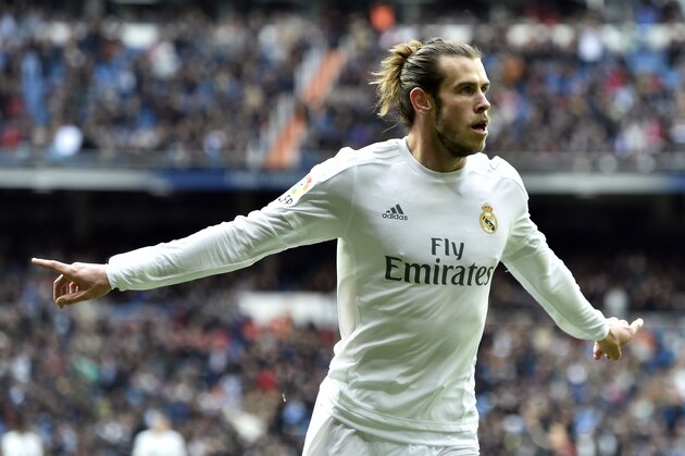 Real Madrid's Welsh forward Gareth Bale celebrates a goal during the Spanish league football match Real Madrid CF vs RC Celta de Vigo at the Santiago Bernabeu stadium in Madrid on March 5, 2016. / AFP / GERARD JULIEN        (Photo credit should read GERARD JULIEN/AFP/Getty Images)