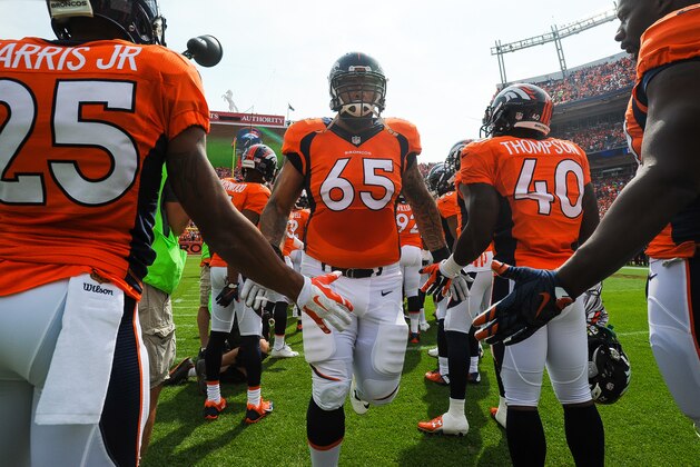DENVER, CO - SEPTEMBER 13:  Tackle Louis Vasquez #65 of the Denver Broncos runs on to the field during player introductions at Sports Authority Field at Mile High on September 13, 2015 in Denver, Colorado.  (Photo by Dustin Bradford/Getty Images)