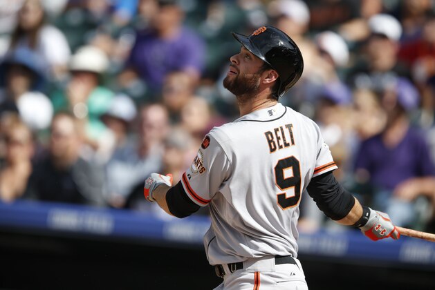 San Francisco Giants first baseman Brandon Belt (9) in the fourth inning of a baseball game Sunday, Sept. 6, 2015, in Denver. San Francisco won 7-4. (AP Photo/David Zalubowski)