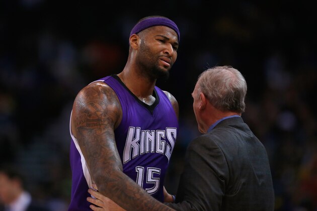 OAKLAND, CA - DECEMBER 28:  DeMarcus Cousins #15 of the Sacramento Kings is consoled by George Karl of the Sacramento Kings after being taken out of the game after he picked up his third foul against the Golden State Warriors at ORACLE Arena on December 28, 2015 in Oakland, California. NOTE TO USER: User expressly acknowledges and agrees that, by downloading and or using this photograph, User is consenting to the terms and conditions of the Getty Images License Agreement.  (Photo by Ezra Shaw/Getty Images)