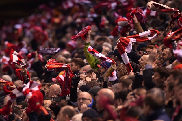 Liverpool fans react after Liverpool's English striker Daniel Sturridge scored their team's first goal during the UEFA Europa League round of 16, first leg football match between Liverpool and Manchester United at Anfield in Liverpool, northwest England on March 10, 2016. / AFP / PAUL ELLIS        (Photo credit should read PAUL ELLIS/AFP/Getty Images)