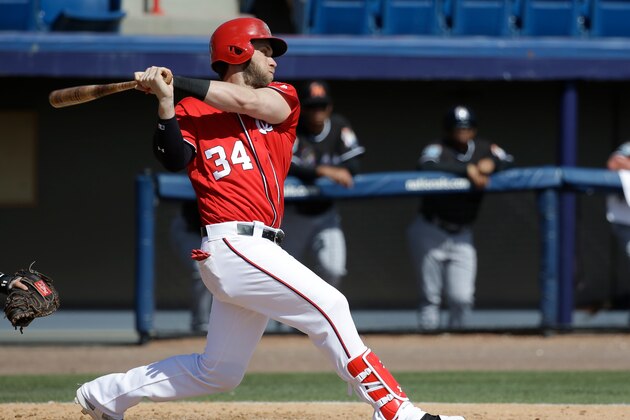 Washington Nationals' Bryce Harper (34) bats against the Miami Marlins in a spring training baseball game, Monday, March 7, 2016, in Viera, Fla. (AP Photo/John Raoux)