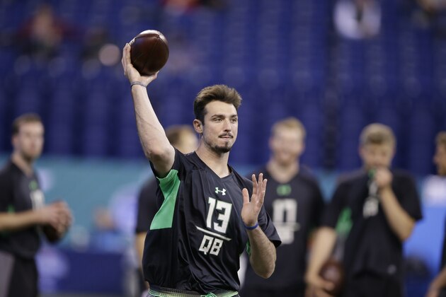 Memphis quarterback Paxton Lynch runs a drill at the NFL football scouting combine on Saturday, Feb. 27, 2016, in Indianapolis. (AP Photo/Darron Cummings)