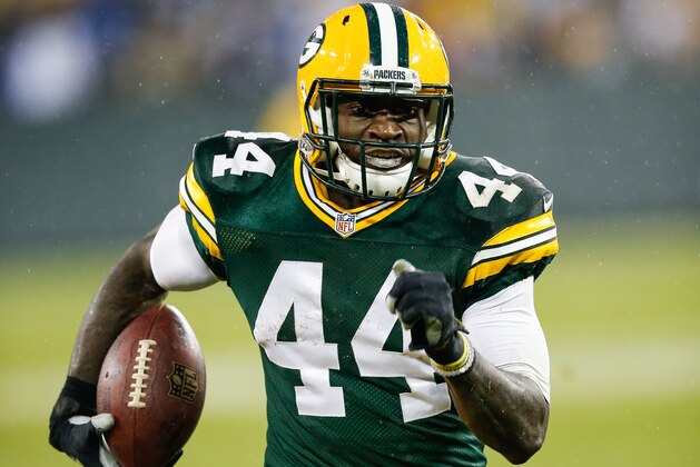 GREEN BAY, WI - DECEMBER 13:  James Starks #44 of the Green Bay Packers runs the football toward the endzone for a touchdown against the Dallas Cowboys in the second quarter at Lambeau Field on December 13, 2015 in Green Bay, Wisconsin.  (Photo by Joe Robbins/Getty Images)