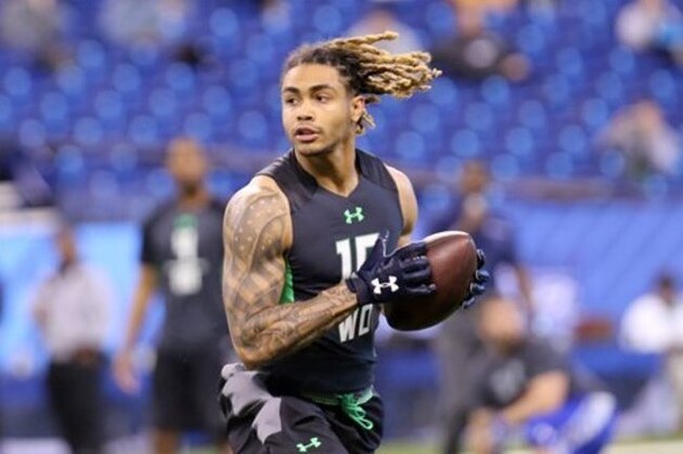 Notre Dame receiver Will Fuller performs a drill at the NFL football scouting combine Saturday, Feb. 27, 2016, in Indianapolis. (AP Photo/Gregory Payan)