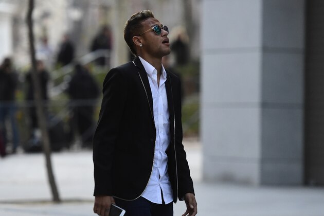 Barcelona's Brazilian forward Neymar leaves Spain's national court in Madrid on February 2, 2016. Barcelona star Neymar and president Josep Maria Bartomeu will be called to give evidence this week in the murky case over the deal which brought the Brazilian to the Catalan giants from Santos in 2013.   AFP PHOTO/ JAVIER SORIANO / AFP / JAVIER SORIANO        (Photo credit should read JAVIER SORIANO/AFP/Getty Images)