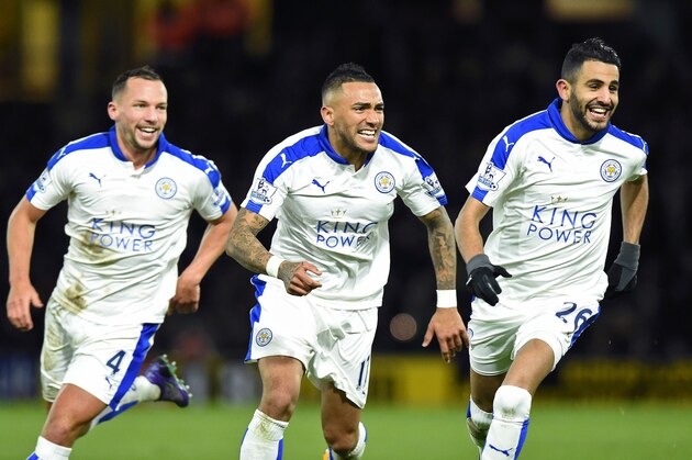 Leicester City's Algerian midfielder Riyad Mahrez (R) celebrates scoring his team's first goal with Leicester City's English midfielder Danny Drinkwater and Leicester City's Ghanaian midfielder Daniel Amartey (C) during the English Premier League football match between Watford and Leicester City at Vicarage Road Stadium in Watford, north of London on March 5, 2016. / AFP / OLLY GREENWOOD / RESTRICTED TO EDITORIAL USE. No use with unauthorized audio, video, data, fixture lists, club/league logos or 'live' services. Online in-match use limited to 75 images, no video emulation. No use in betting, games or single club/league/player publications.  /         (Photo credit should read OLLY GREENWOOD/AFP/Getty Images)