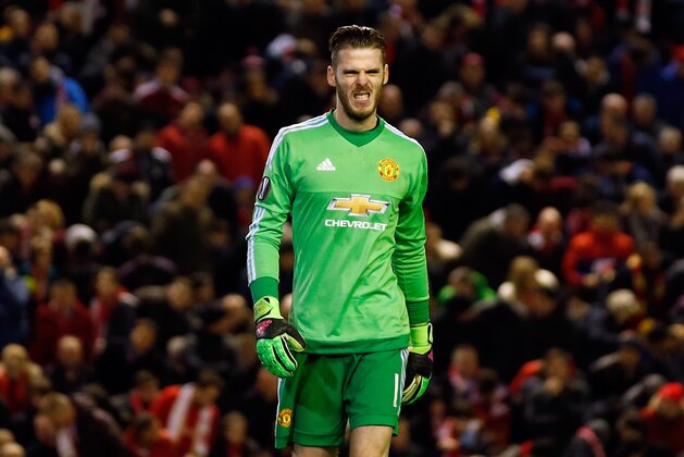 United goalkeeper David De Gea reacts during the Europa League round of 16, first leg, soccer match between Liverpool and  Manchester United at Anfield Stadium, Liverpool, England, Thursday March 10, 2016. (AP Photo/Jon Super)