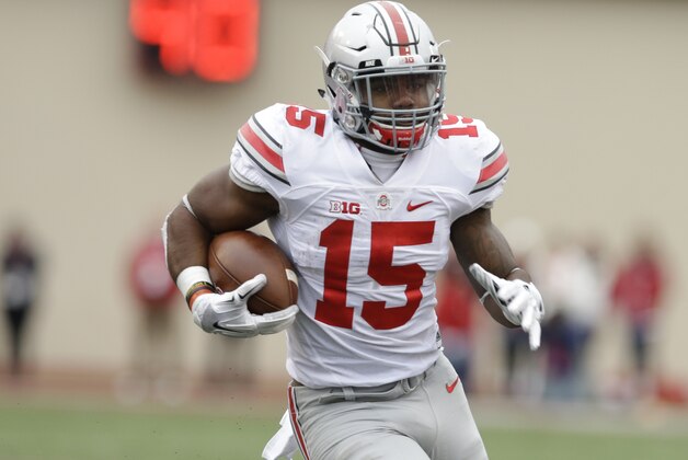 Ohio State's Ezekiel Elliott runs during the first half of an NCAA college football game against Indiana, Saturday, Oct. 3, 2015 in Bloomington, Ind. (AP Photo/Darron Cummings)