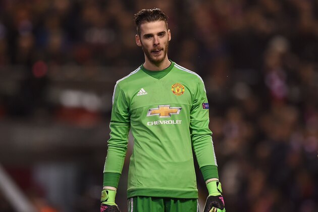 Manchester United's Spanish goalkeeper David de Gea reacts during the UEFA Europa League round of 16, first leg football match between Liverpool and Manchester United at Anfield in Liverpool, northwest England on March 10, 2016. / AFP / PAUL ELLIS        (Photo credit should read PAUL ELLIS/AFP/Getty Images)