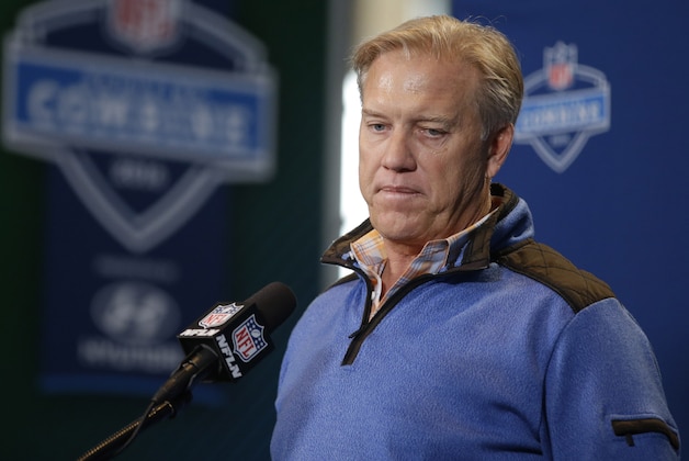 Denver Broncos general manager John Elway listens to a question during a news conference at the NFL football scouting combine Thursday, Feb. 25, 2016, in Indianapolis. (AP Photo/Darron Cummings)