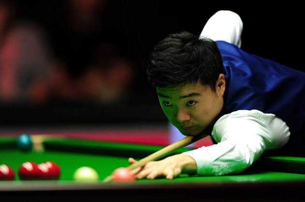 LONDON, ENGLAND - JANUARY 10:  Ding Junhui of China plays a shot against Stuart Bingham of England  during Day One of the Dafabet Masters at Alexandra Palace on January 10, 2016 in London, England.  (Photo by Dan Mullan/Getty Images)