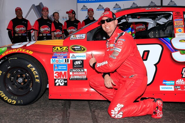 AVONDALE, AZ - MARCH 11:  Kyle Busch, driver of the #18 Skittles Toyota, poses for a photo after winning the pole award during qualifying for the NASCAR Sprint Cup Series Good Sam 500 at Phoenix International Raceway on March 11, 2016 in Avondale, Arizona.  (Photo by Chris Trotman/Getty Images)