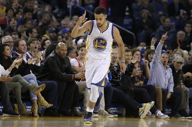 Golden State Warriors' Stephen Curry celebrates a score against the Portland Trail Blazers during the first half of an NBA basketball game Friday, March 11, 2016, in Oakland, Calif. (AP Photo/Ben Margot)
