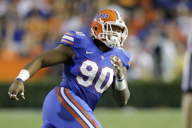 Florida defensive lineman Jonathan Bullard (90) rushes the New Mexico State line during the second half of an NCAA college football game, Saturday, Sept. 5, 2015, in Gainesville, Fla. Florida won 61-13. (AP Photo/John Raoux)