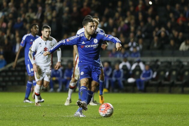 Chelsea's Eden Hazard scores a penalty kick during the English FA Cup fourth round soccer match between Milton Keynes Dons and Chelsea at Stadium mk in Milton Keynes, England, Sunday, Jan. 31, 2016. (AP Photo/Kirsty Wigglesworth)