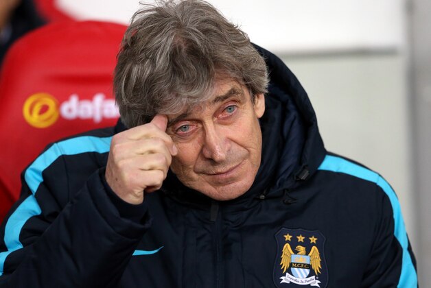 Manchester City's manager Manuel Pellegrini awaits the start of the English Premier League soccer match between Sunderland and Manchester City at the Stadium of Light, Sunderland, England, Tuesday, Feb. 2, 2016. (AP Photo/Scott Heppell)