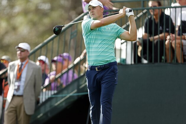 Jordan Spieth hits his tee shot on the first hole during the third round of the Valspar Championship golf tournament Saturday, March 12, 2016, in Palm Harbor, Fla. (AP Photo/Brian Blanco)