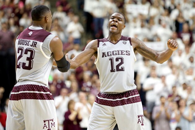 Texas A&M's Jalen Jones (12) reacts with teammate Danuel Jones (23) as timeout is called against Vanderbilt during the second half of an NCAA college basketball game, Saturday, March 5, 2016, in College Station, Texas. Texas A&M won 76-67. (AP Photo/Sam Craft)